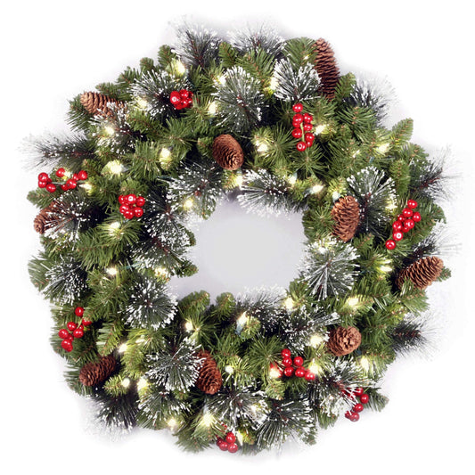 National Tree Company 24 in Pre-Lit Crestwood Spruce Artificial Christmas Wreath, Christmas Decoration with Glitter, Pinecones, Red Berries, 50 Clear LED Lights, 160 Tips, Timer, Green